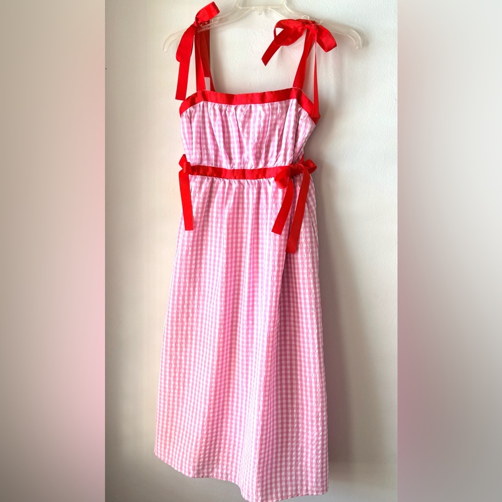 Pink gingham midi sundress with red grosgrain ribbon trim